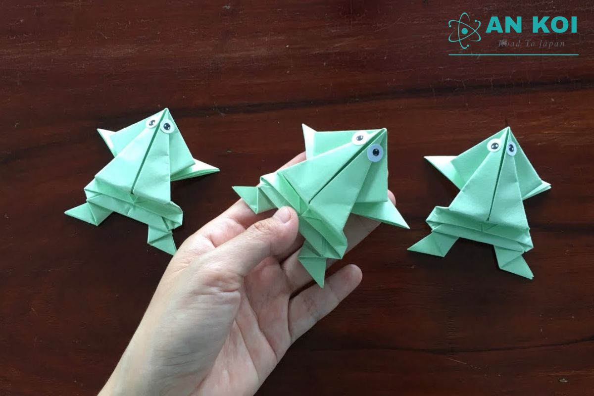 This paper frog is an example of Origami that uses a folded structure to create a movement effect when handled.